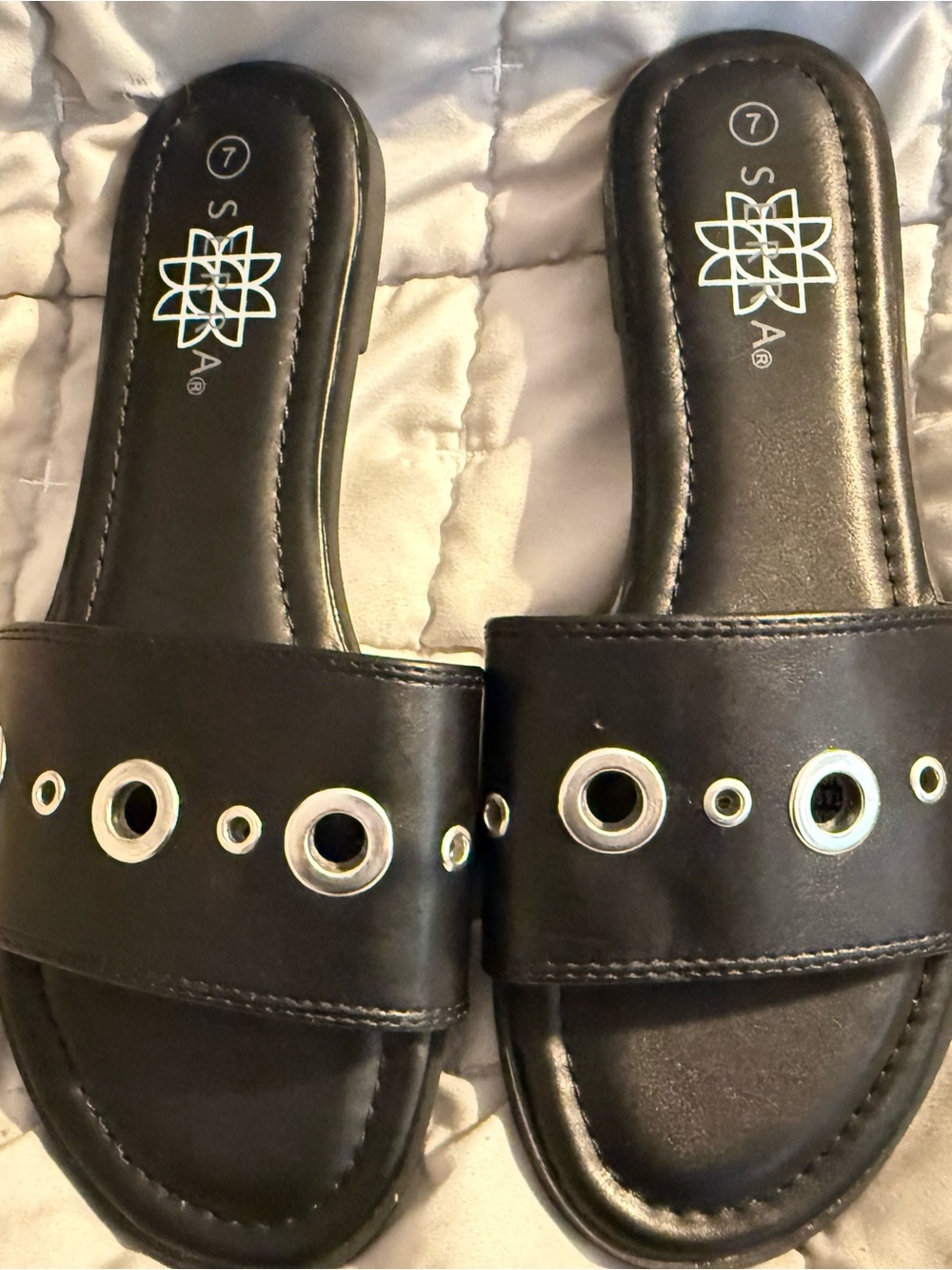 Serra Black Slide Sandals with Silver Eyelet Accents